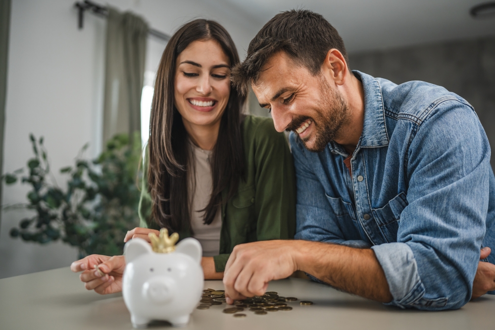 Couple Saving Money - APY vs Interest Rate