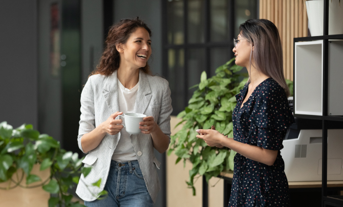 Two women business conversation