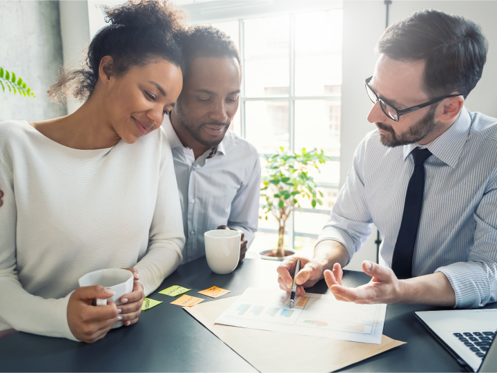 Banker and clients discuss escrow