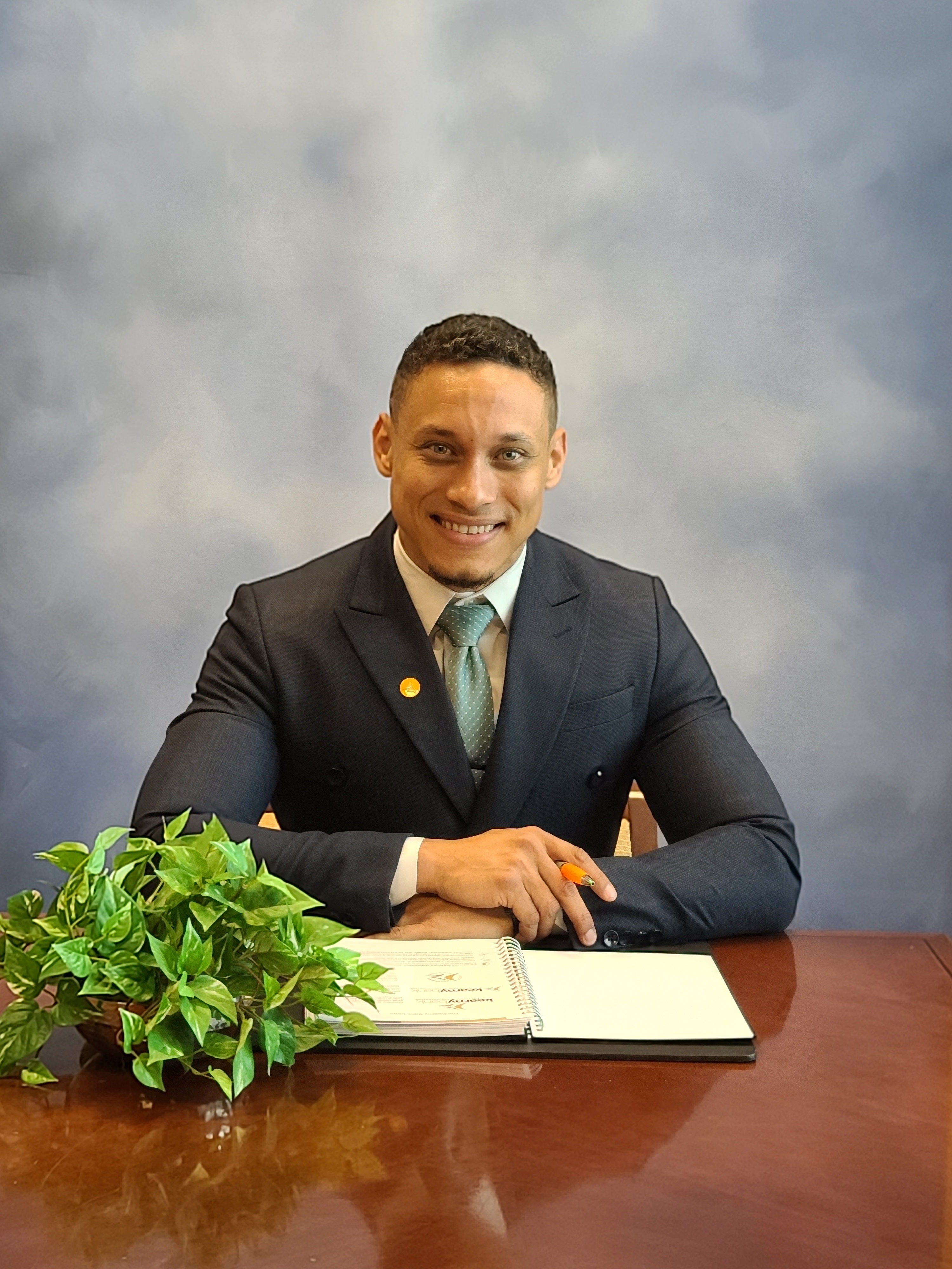 Professional portrait of a branch manager wearing a suit