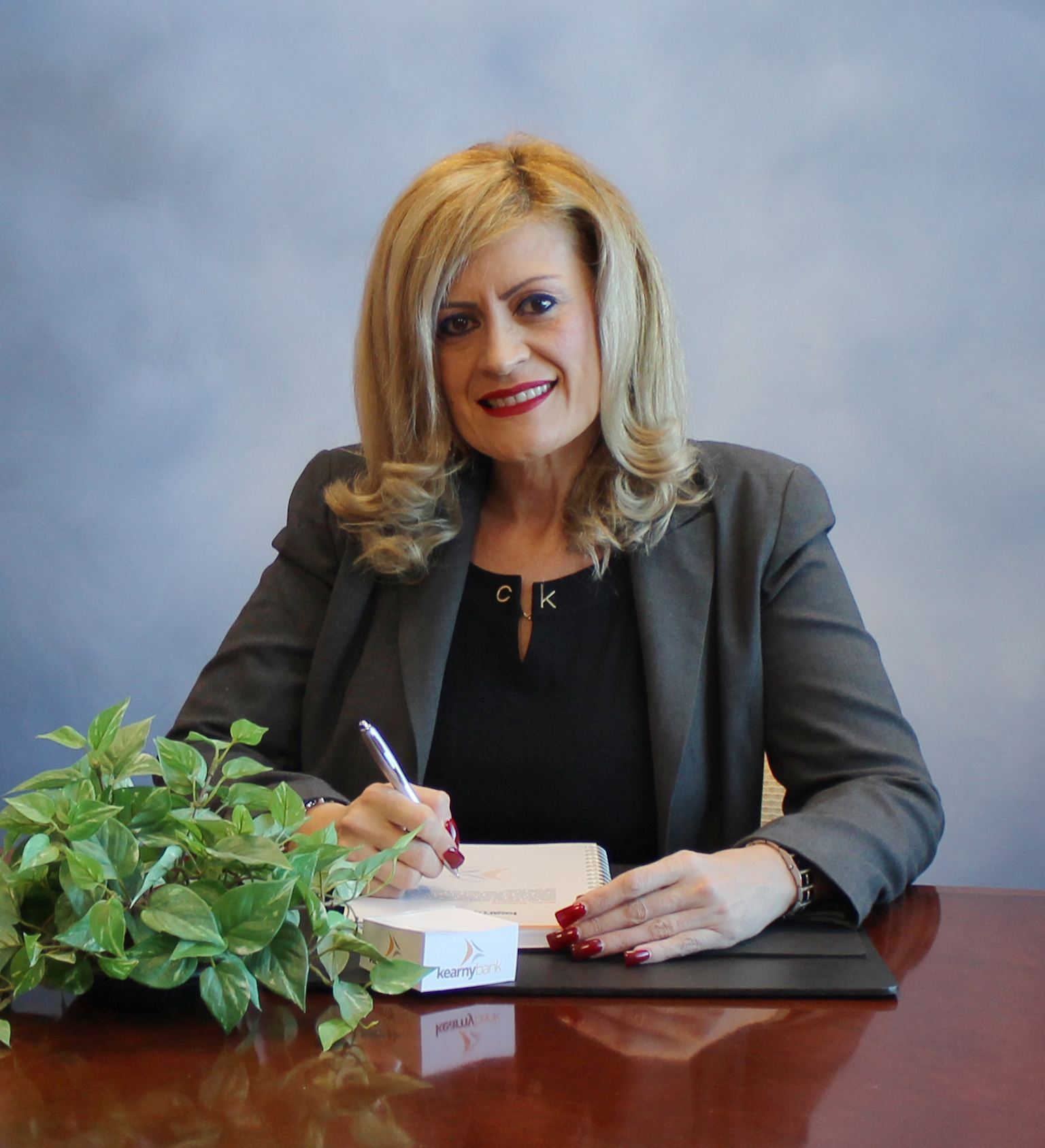 Headshot of a branch manager with a bright, approachable smile