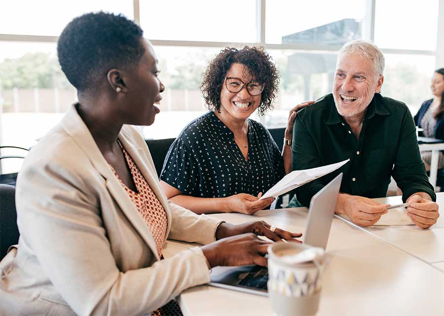 People sitting at a table in a business setting