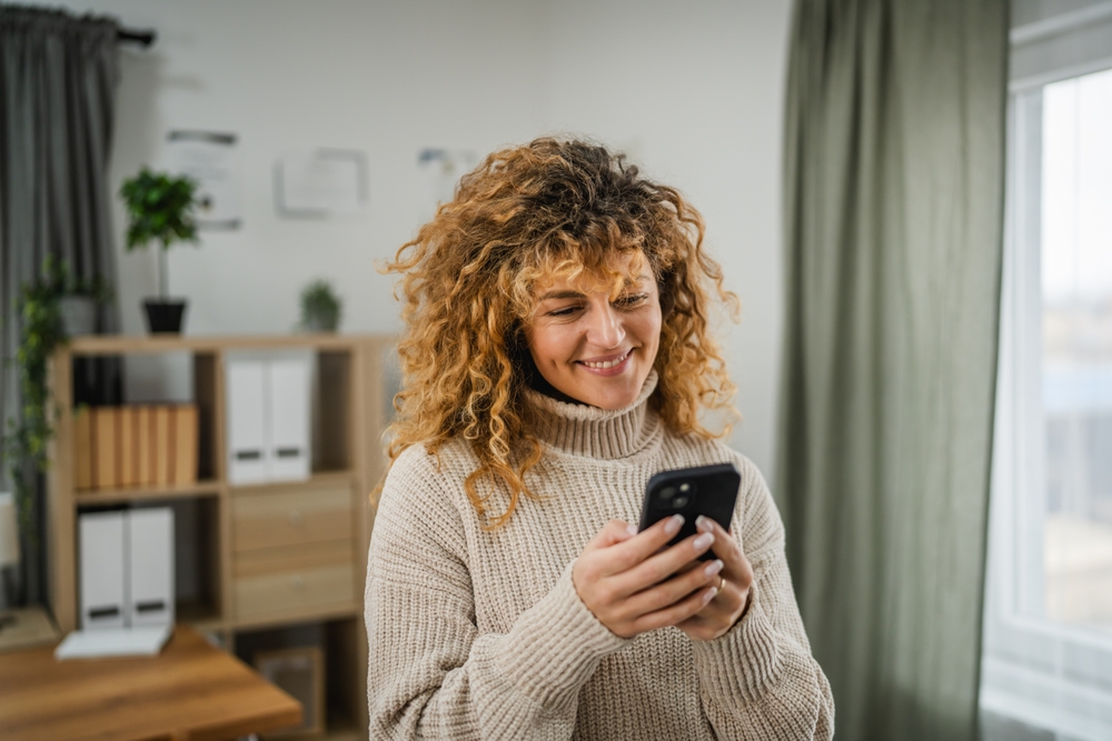 Woman using digital banking on smartphone