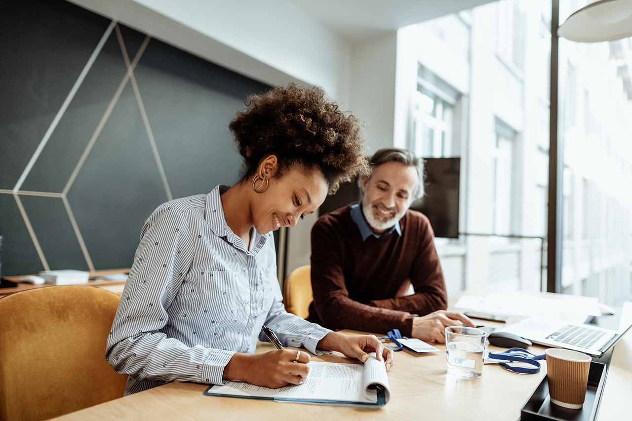 Woman and man conducting business