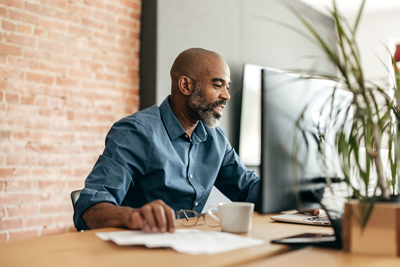 man working at computer