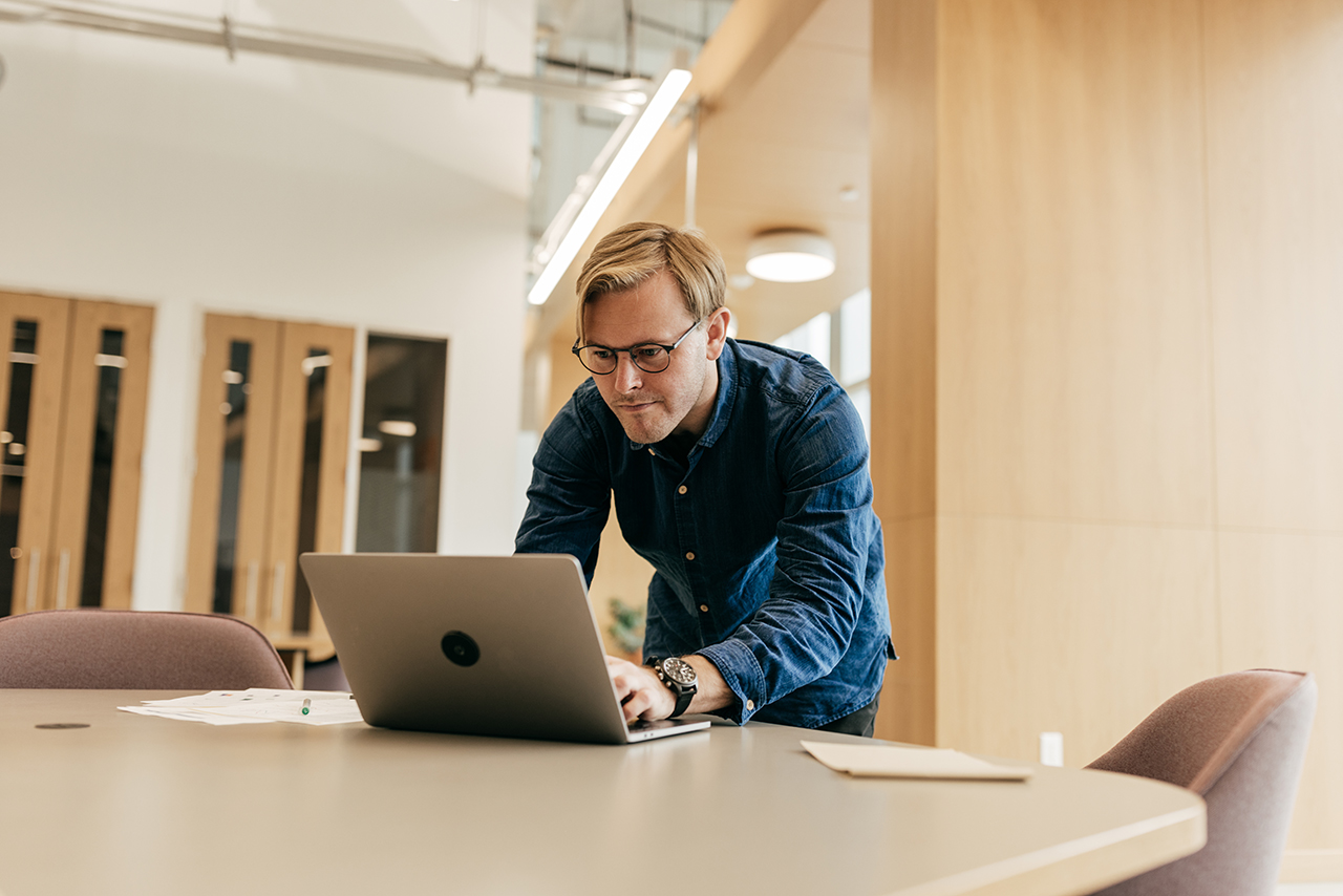man working on his computer