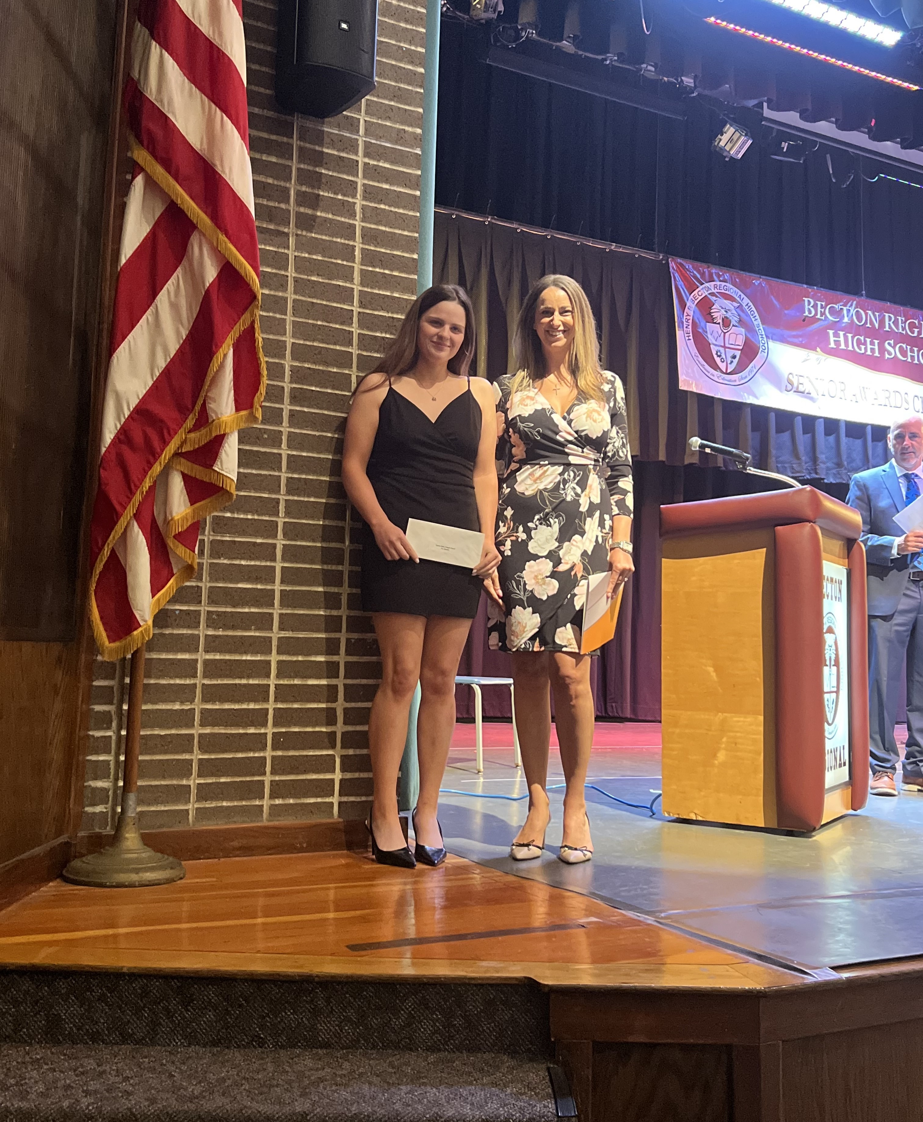 Ava Romano (left) receives Strength Award from Kearny Bank’s Lisa Bernardo
