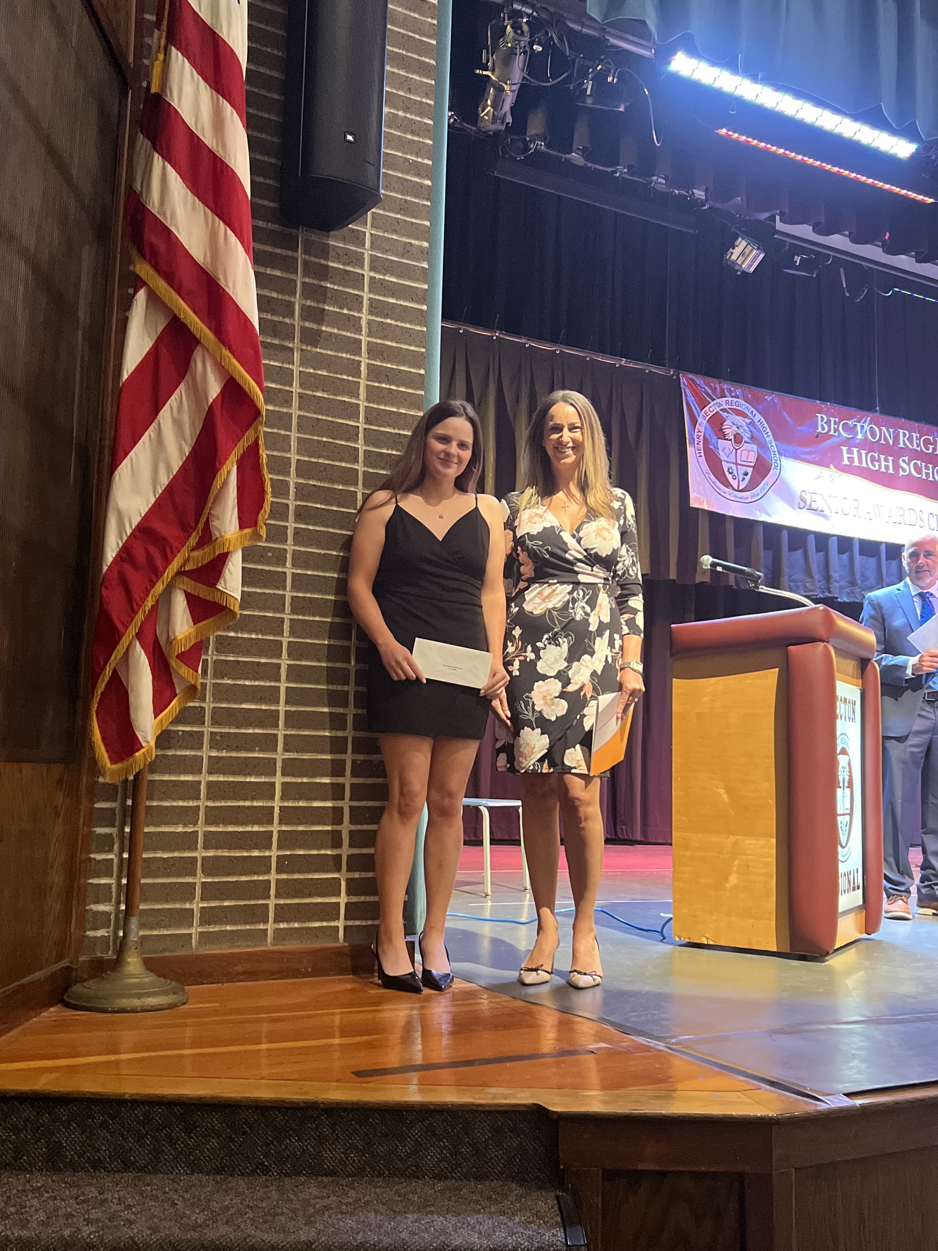 Ava Romano (left) receives Strength Award from Kearny Bank’s Lisa Bernardo