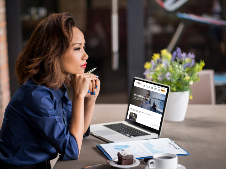 concerned middle age latina woman review kearny bank commercial loan page